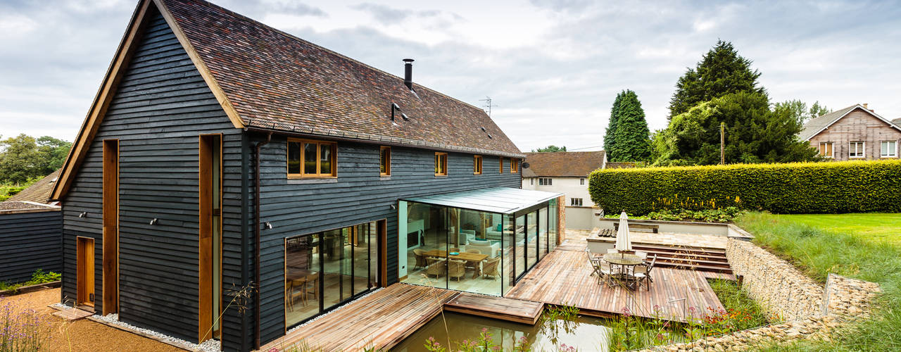 Double Height Structural Glass Atrium and Rear Extension , Trombe Ltd Trombe Ltd Modern living room