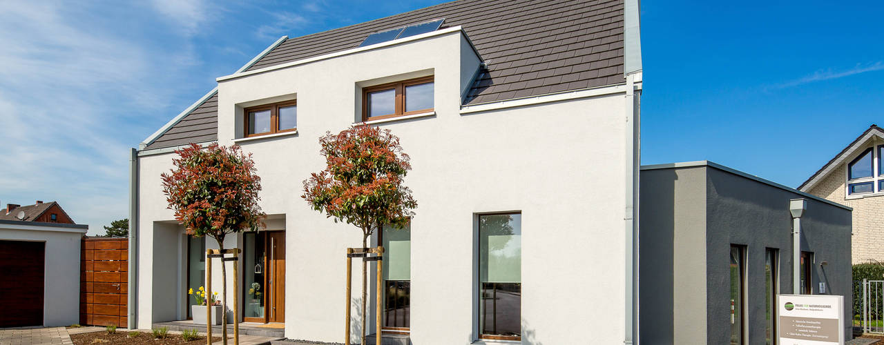 Haus A - Umbau und Anbau in Holzständerbau, Architektur Jansen Architektur Jansen Casas de estilo minimalista