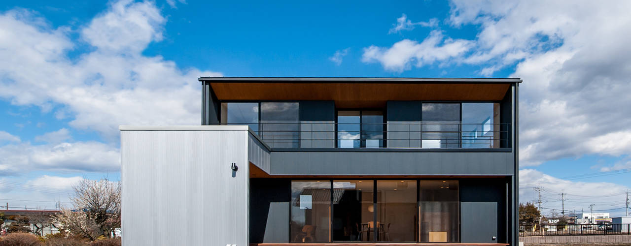 太陽の光が降り注ぐ南向きの家 Homify