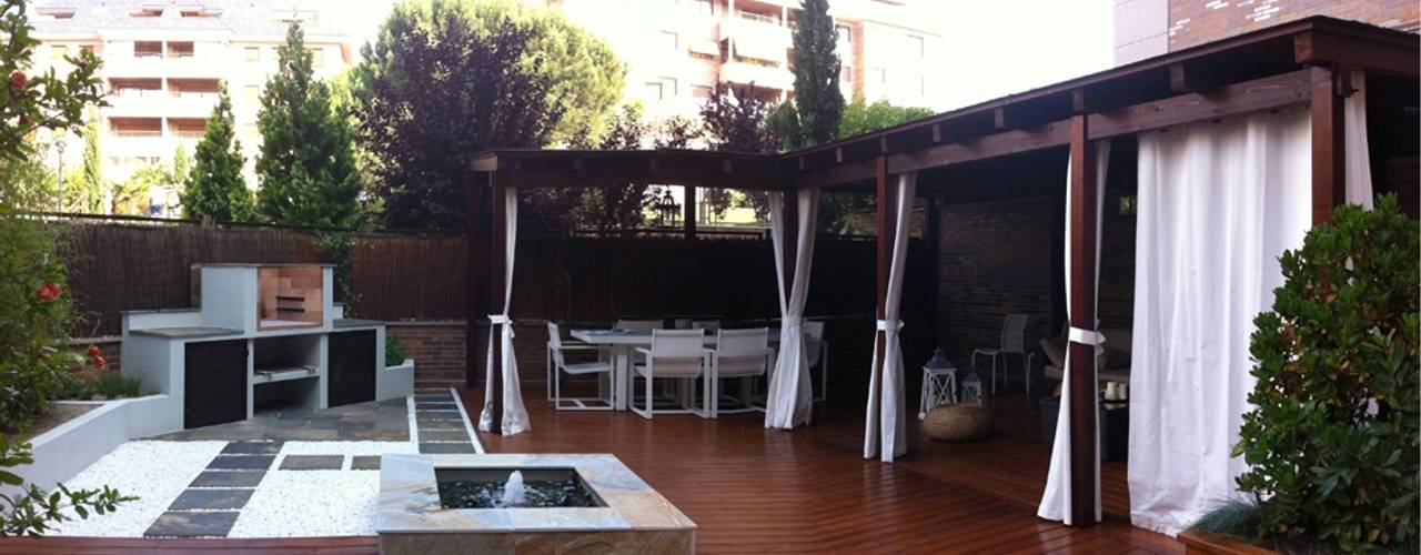 DECORACIÓN PATIO MADRID, La Patioteca La Patioteca Jardines modernos: Ideas, imágenes y decoración Madera Acabado en madera