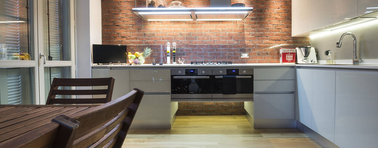 Una cucina in stile industriale con i mattoni faccia a vista Genesis, B&B Rivestimenti Naturali B&B Rivestimenti Naturali Cocinas de estilo industrial Ladrillos