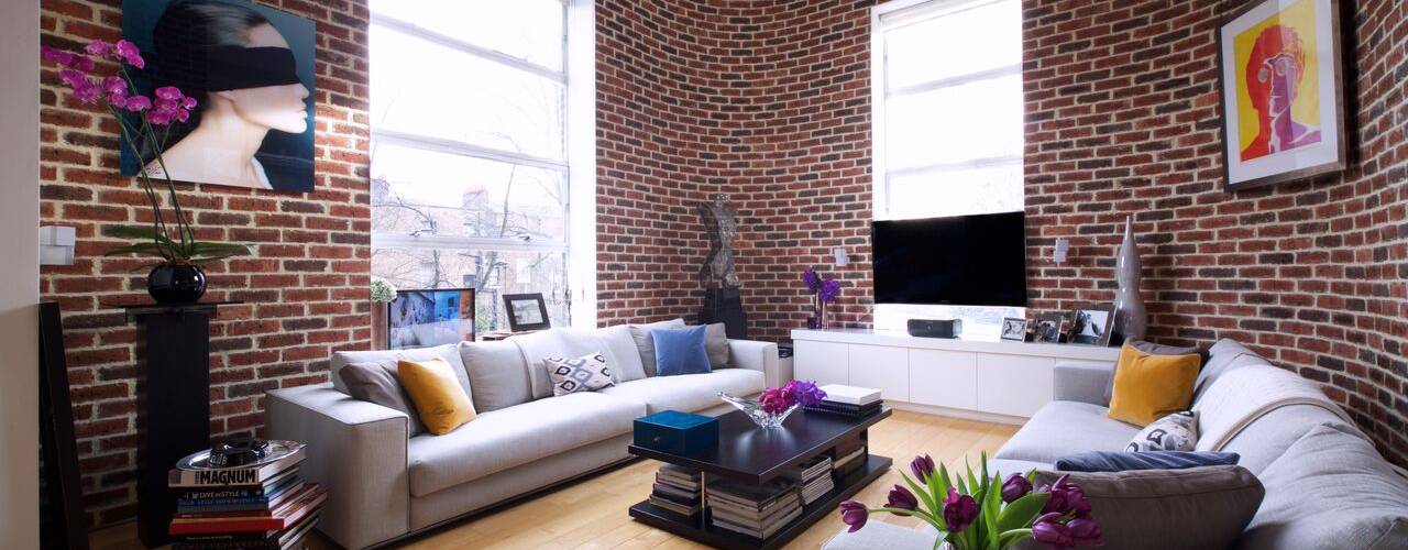 London Loft, JKG Interiors JKG Interiors Industrial style living room Bricks