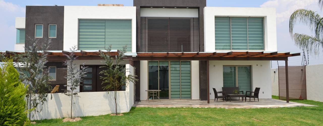 RESIDENCIA SOSA, ANTARA DISEÑO Y CONSTRUCCIÓN SA DE CV ANTARA DISEÑO Y CONSTRUCCIÓN SA DE CV Modern houses پتھر