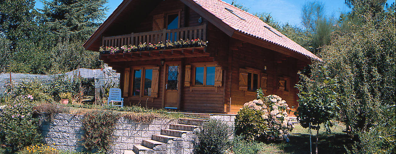 RUSTICASA | 100 projetos | Portugal + Espanha, RUSTICASA RUSTICASA Chalets & maisons en bois Bois massif Multicolore