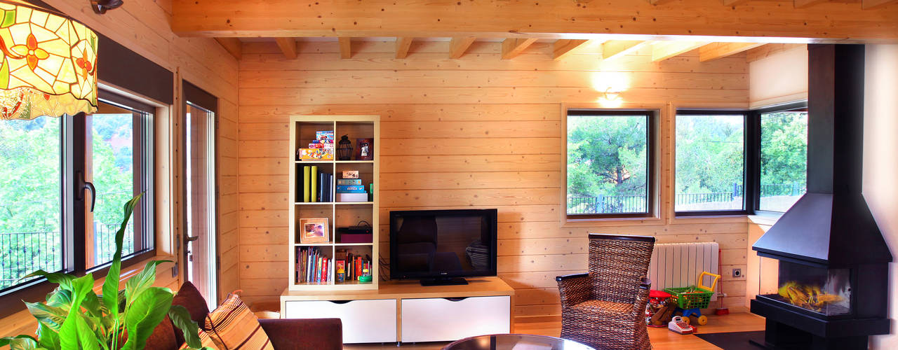 RUSTICASA | Casa em La Garriga | Barcelona, RUSTICASA RUSTICASA Rustic style living room Solid Wood Multicolored