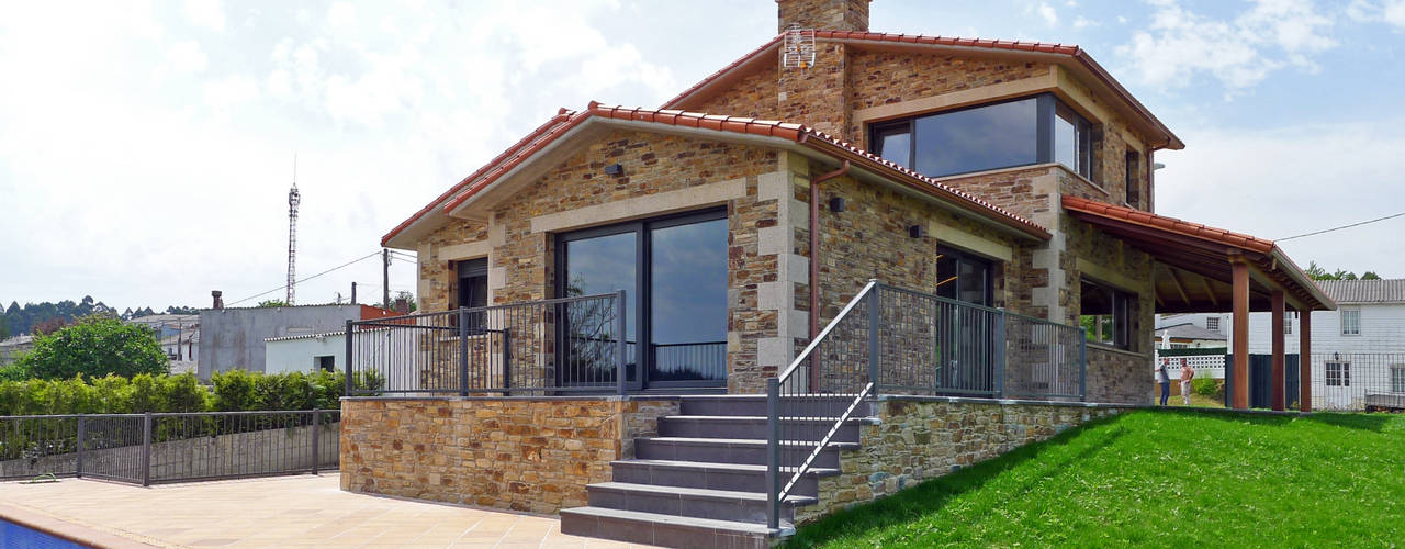 Vivienda en Veigue, AD+ arquitectura AD+ arquitectura Rustic style house Stone