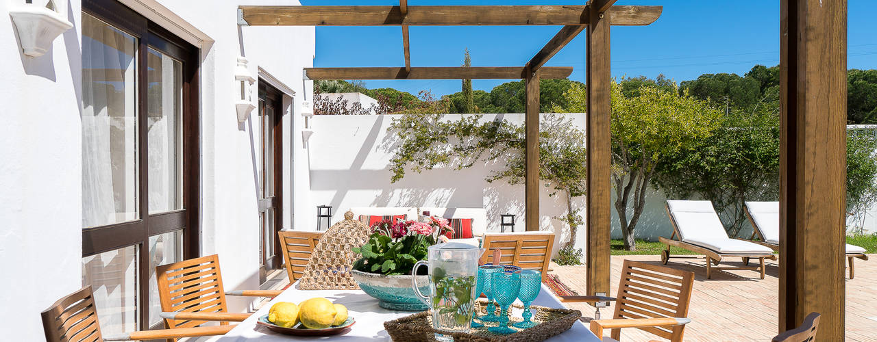 Casa de férias no Algarve, The Interiors Online The Interiors Online Eclectic style houses