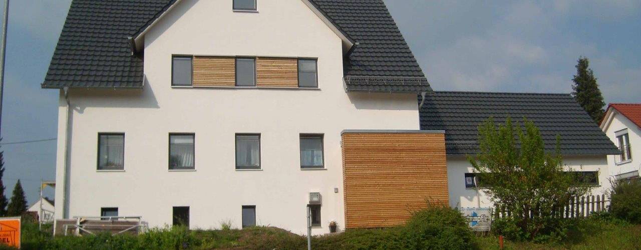 Modernisierung und Umbau eines Zweifamilienwohnhauses TE, a r c h i t e k t u r b ü r o grimm a r c h i t e k t u r b ü r o grimm Casas modernas