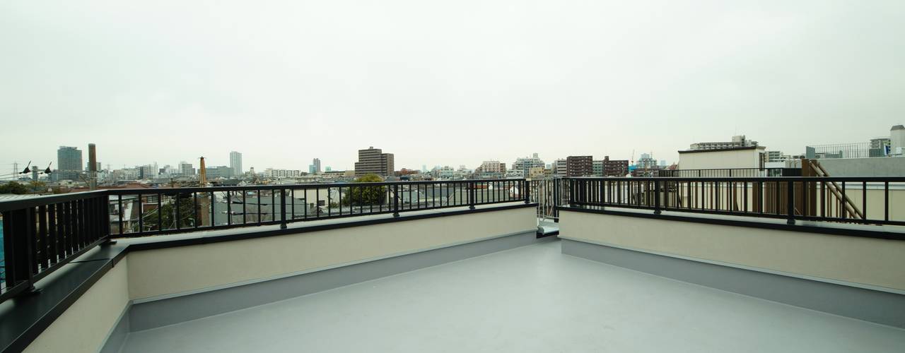 屋上テラスとビルトインガレージのあるモダンな住まい Homify