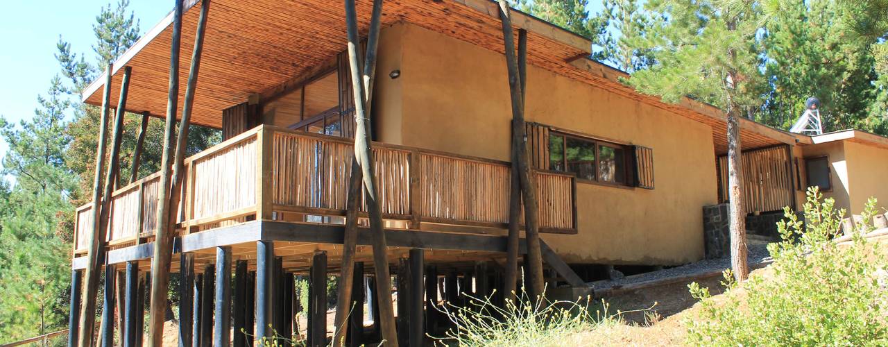 CASA DE FARDOS, FUNDO MILLACO, PICHILEMU, KIMCHE ARQUITECTOS KIMCHE ARQUITECTOS Casas de estilo rústico