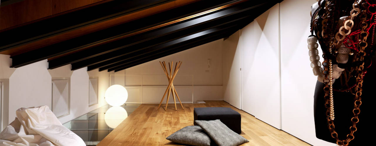 Casa Okume : Moderna abitazione a Torino, Paola Maré Interior Designer Paola Maré Interior Designer モダンスタイルの寝室 木 木目調