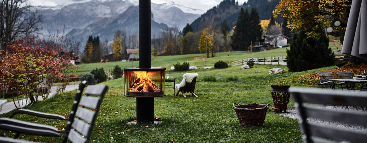 Outdoor-Feuerstelle Rüegg SURPRISE, Rüegg Cheminée Schweiz AG Rüegg Cheminée Schweiz AG Balkon, Beranda & Teras Klasik Besi/Baja