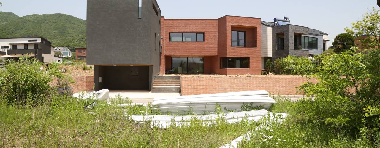 지산발트 하우스 지우, 인문학적인집짓기 인문학적인집짓기 Single family home Bricks