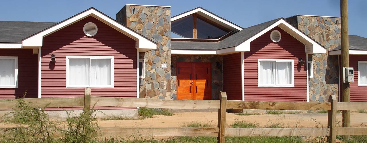 Vivienda Wilson por ARKITEKTURA, ARKITEKTURA ARKITEKTURA Casas unifamiliares Metal