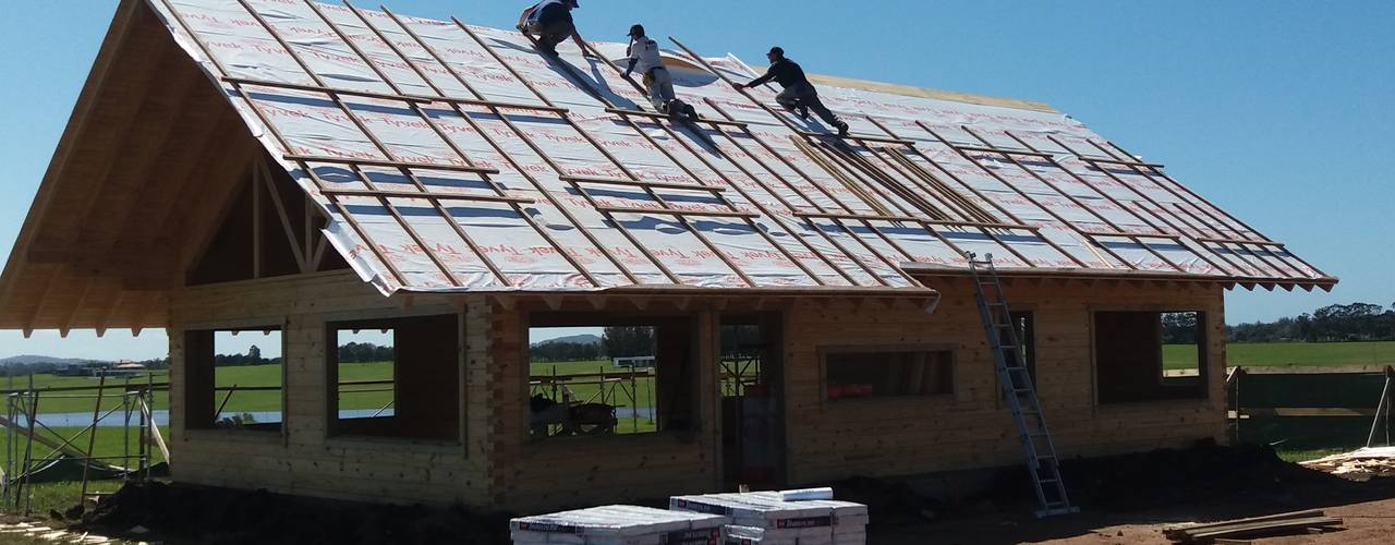 Casa en Uruguay (Construcción en 15 días) Superficie cubierta de 130 m2, Patagonia Log Homes - Arquitectos - Neuquén Patagonia Log Homes - Arquitectos - Neuquén Chalets & maisons en bois Bois Effet bois