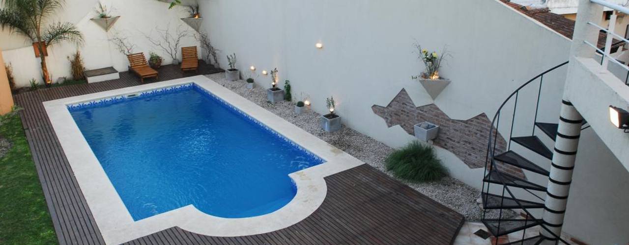 Casa AGC, Luis Barberis Arquitectos Luis Barberis Arquitectos Giardino con piscina