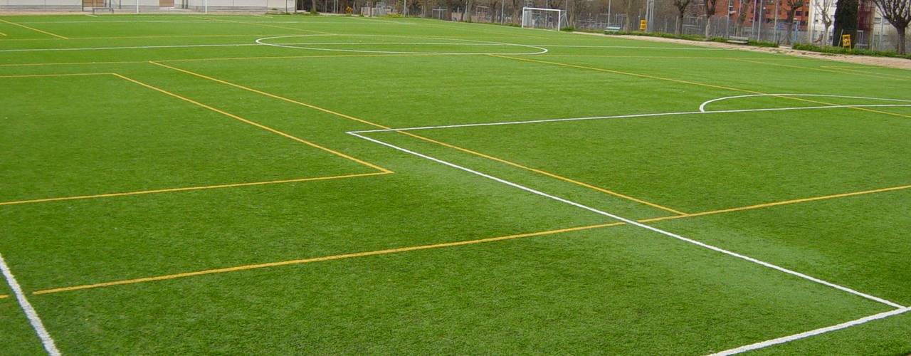 Instalación de césped artificial para campos de fútbol y áreas de deportes, Albergrass césped tecnológico Albergrass césped tecnológico Espaces commerciaux