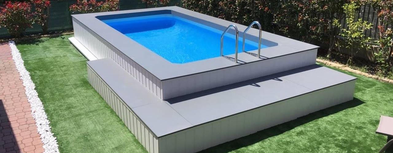 Piscina fuori terra seminterrata: Aquazzura Piscine può realizzare con facilità il tuo progetto, Aquazzura Piscine Aquazzura Piscine مسبح حديقة