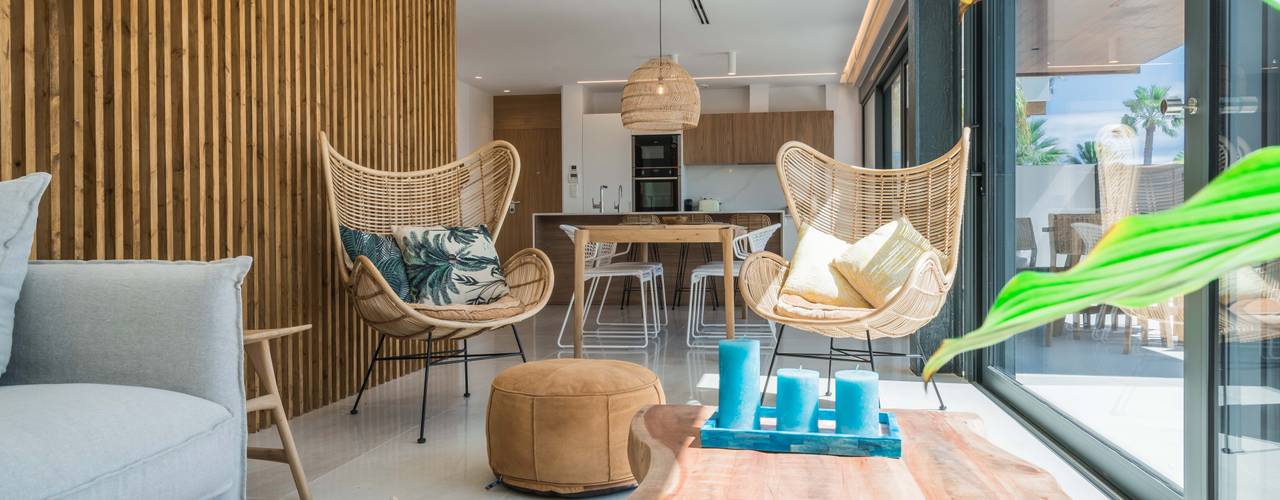 Interiorismo de estilo mediterráneo y diseño de cocina en apartamento (casa en la playa), ARREL arquitectura ARREL arquitectura Śródziemnomorski salon