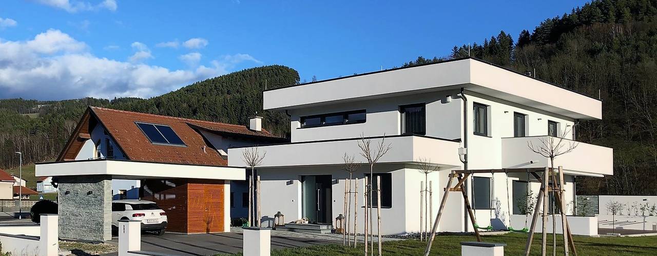 Haus mit markanter Attika, archipur Architekten aus Wien archipur Architekten aus Wien Einfamilienhaus Ziegel Weiß