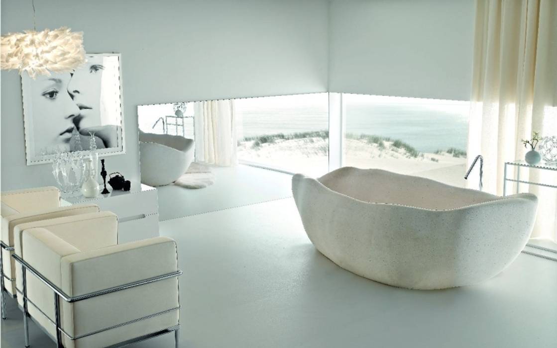 Naturstein-Badewanne Design by Torsten Müller Baños de estilo ecléctico Bañeras y duchas