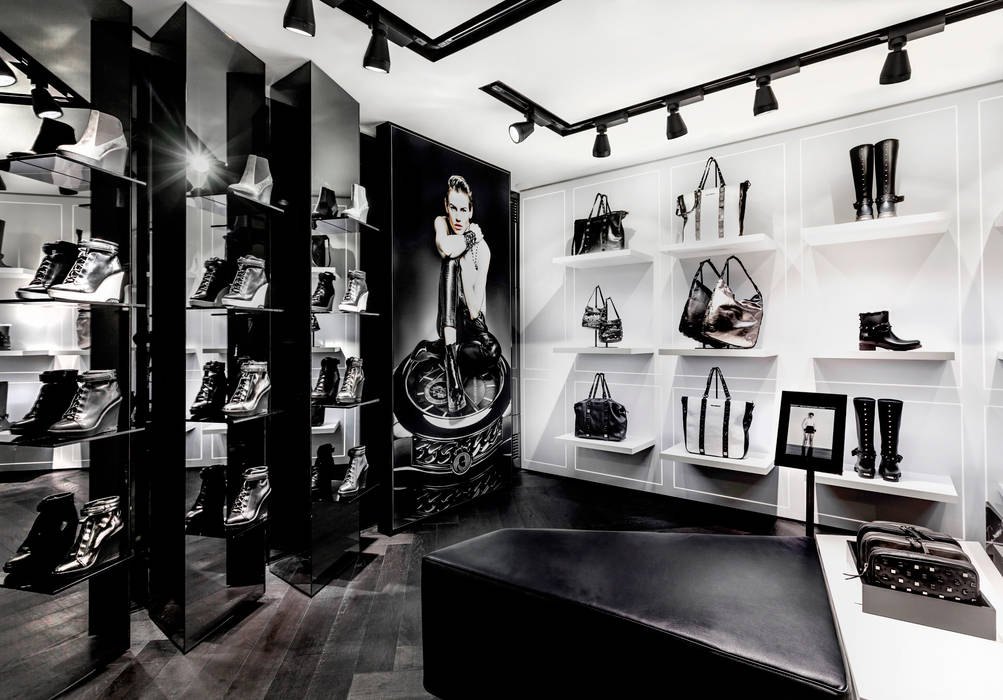 KARL LAGERFELD store in paris, plajer & franz studio plajer & franz studio Gewerbeflächen Möbel,Gebäude,Regal,Bilderrahmen,Schwarz,Automobildesign,Regale,Innenarchitektur,Mode,Schwarz und weiß,Geschäftsräume & Stores