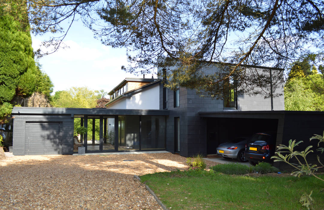 Contemporary Home Restoration and Extension for 1960s house in Haslemere, Surrey ArchitectureLIVE Huizen 1960s,two-storey extension,home extension,car port,artificial slate,insulated render,dual aspect glazing