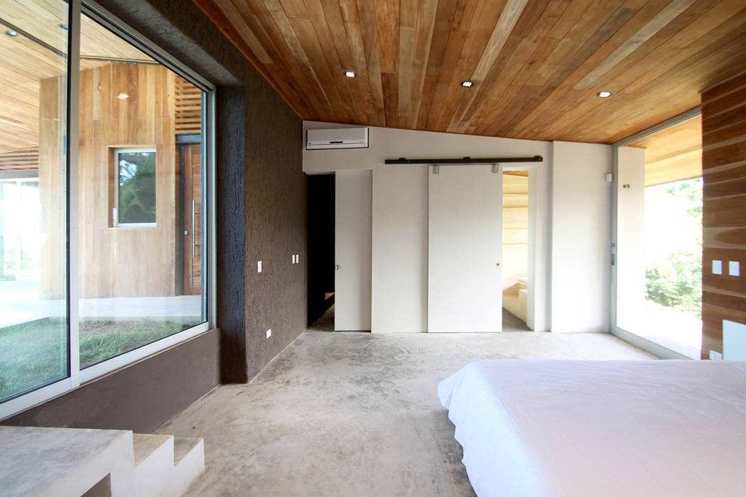 PAVONES SURF LODGE, Filippo Ratini architetti Filippo Ratini architetti Modern style bedroom