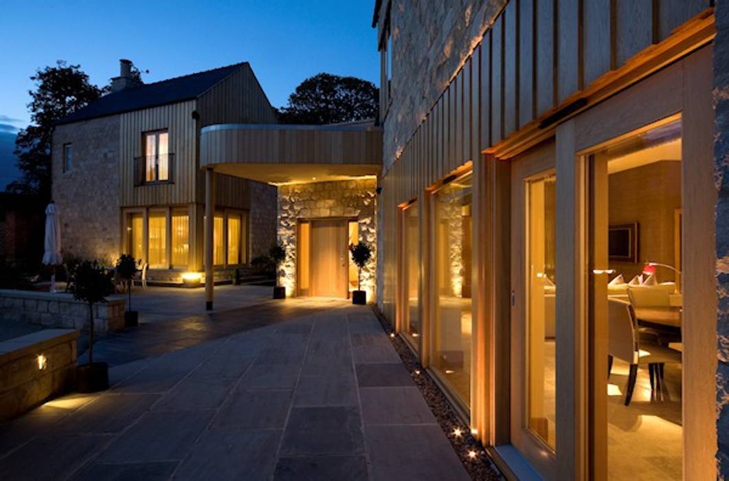 A welcoming, secure courtyard Brilliant Lighting Modern houses