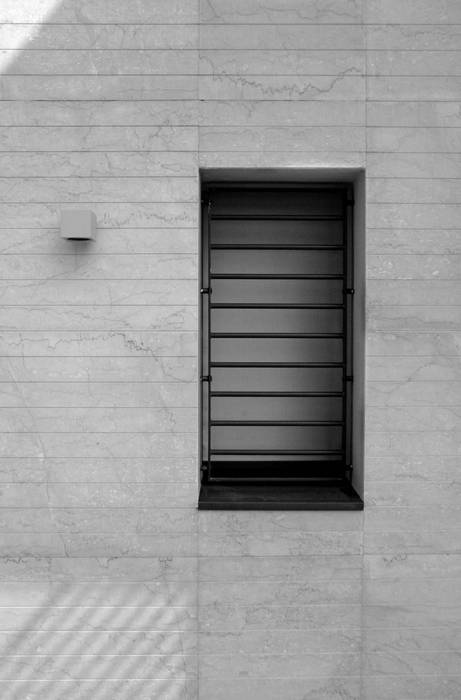 Edificio privato in classe A, boschi + serboli architetti associati boschi + serboli architetti associati Modern windows & doors