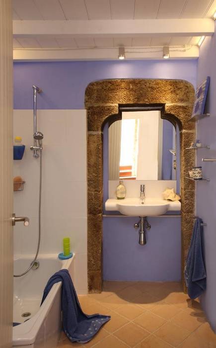 Proyecto iluminación, restauración de una casa rústica, OutSide Tech Light OutSide Tech Light Rustic style bathroom Lighting