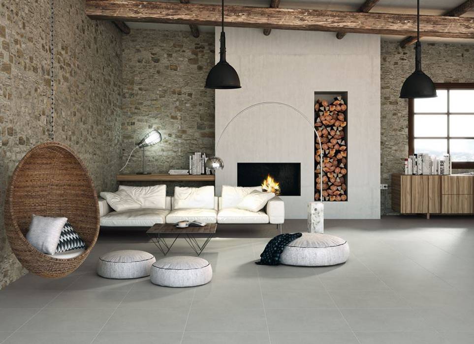 Salón contemporáneo con pavimento de inspiración cemento. Porcelanite Dos Paredes y suelos de estilo moderno Revestimientos de paredes y suelos