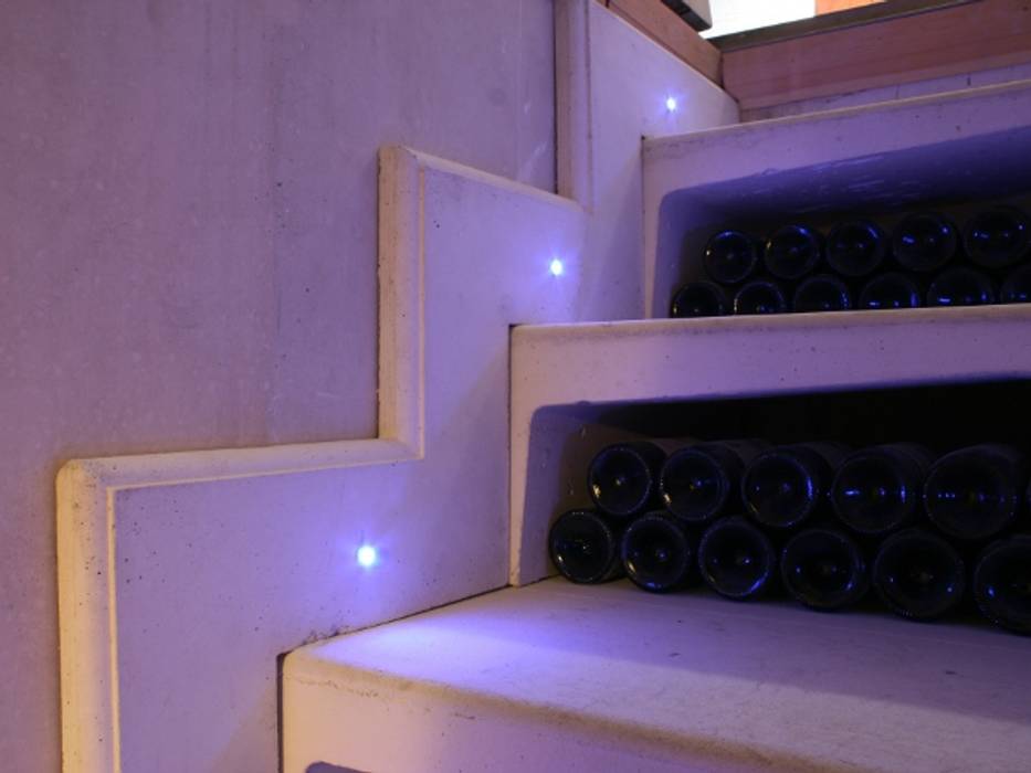 Illuminated Staircase Stone Cellar Company Modern wine cellar