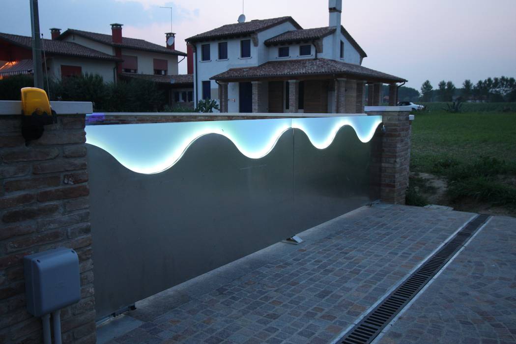 LED&MOTION, STUDIO ARCH. GIANNI RIGO STUDIO ARCH. GIANNI RIGO Jardines