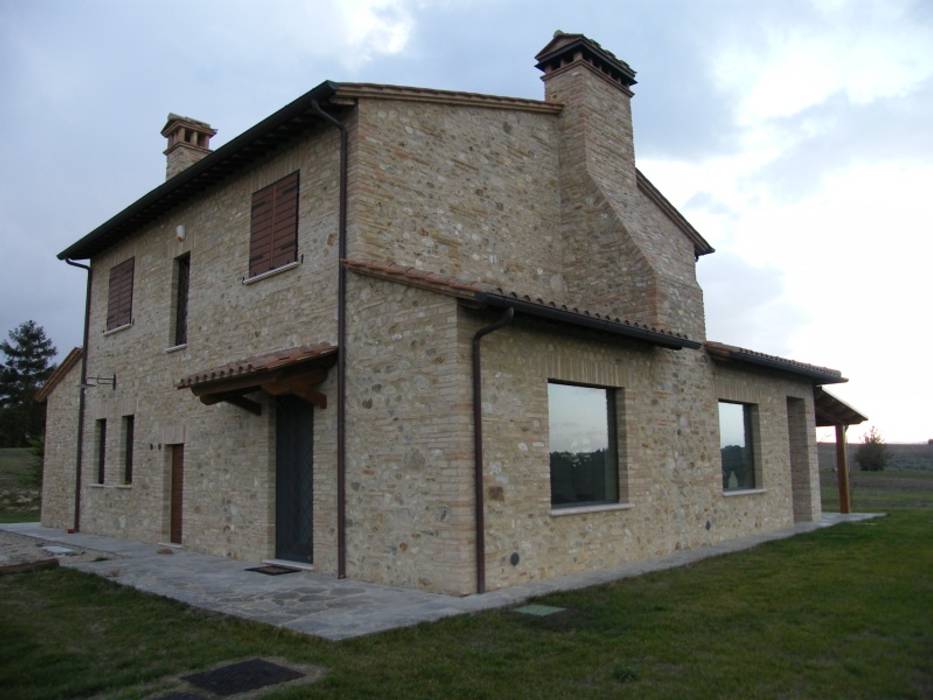 Ristrutturazione casale di campagna. Umbria. Provincia di Perugia Studio Architetti Cornacchini - De Boni Casa rurale