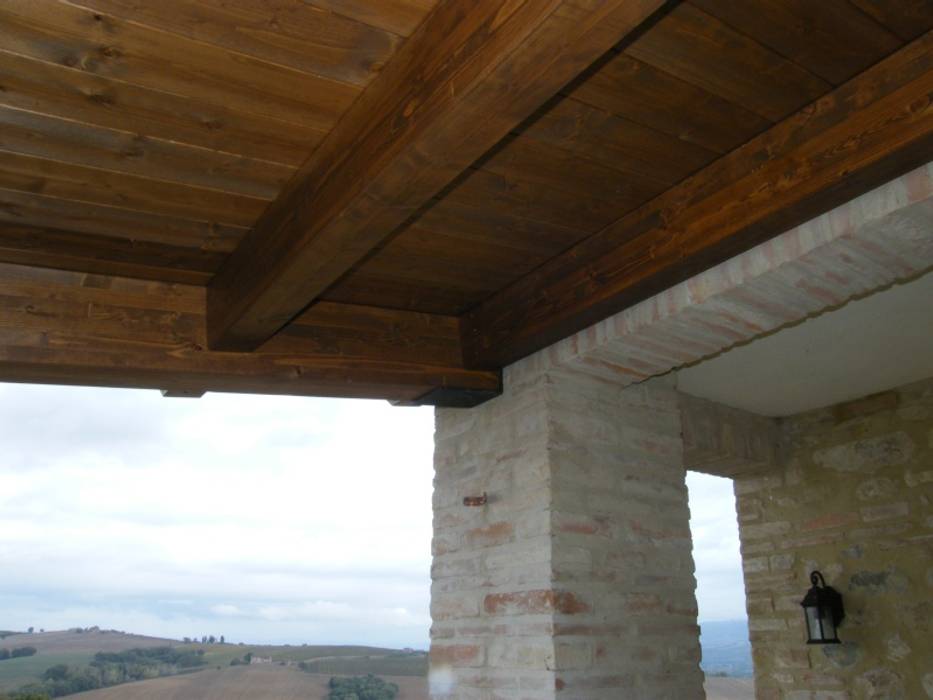 Ristrutturazione casale di campagna. Umbria. Provincia di Perugia Studio Architetti Cornacchini - De Boni Balcone, Veranda & Terrazza in stile rurale