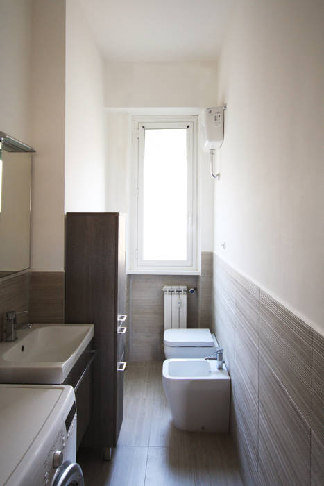 Bagno con rivestimenti in Gres by Ariostea EMC2Architetti Bagno moderno bagno,mobili bagno,sanitari,rubinetteria