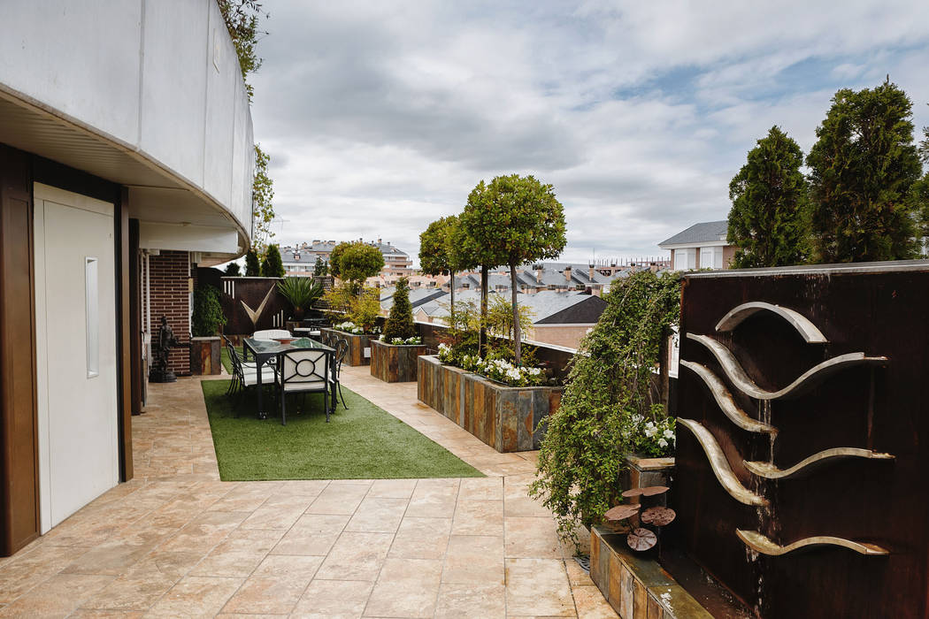 Un espacio renovado, Slabon Forja Creativa Slabon Forja Creativa Patios