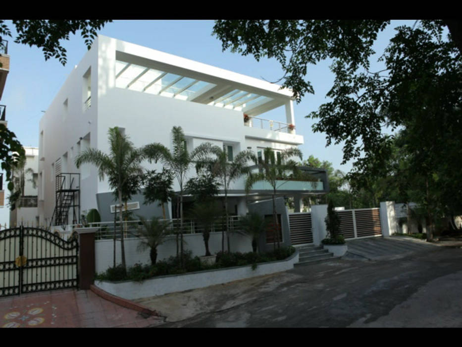 A Modern and Contemporary Residence in Filmnagar, Artifice Design Consultants: modern by Artifice Design Consultants,Modern Sky,Building,Plant,Tree,Shade,Door,Urban design,Residential area,Facade,Real estate