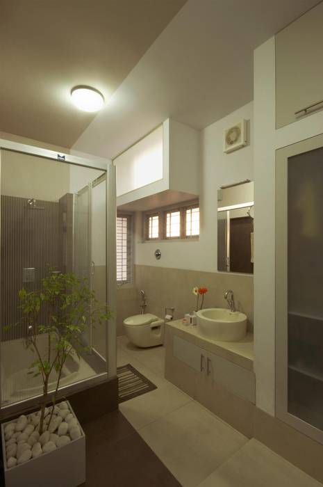 Residence at Punkunnam, Thrissur, Kerala., LIJO.RENY.architects LIJO.RENY.architects Houses