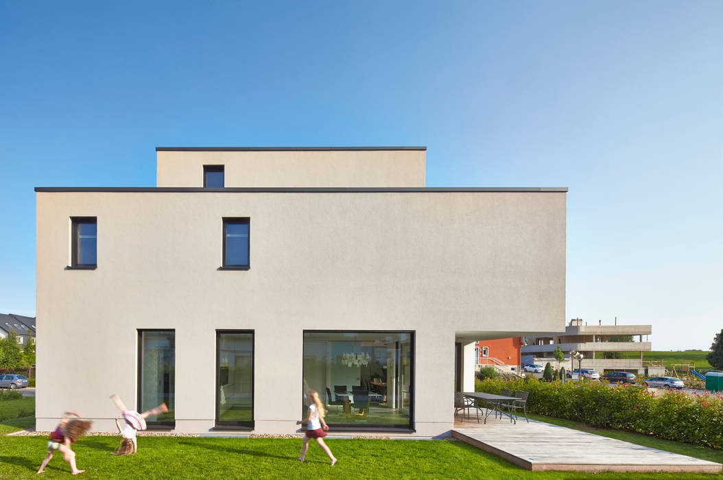 Einfamilienhaus in Niedrigenergiebauweise, Bruck + Weckerle Architekten Bruck + Weckerle Architekten 모던스타일 주택