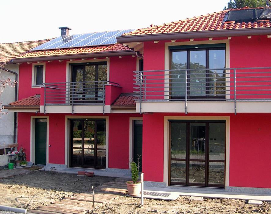 Abitazione bifamiliare con struttura in legno (classe energetica A+), Arch. Dario Nespoli Arch. Dario Nespoli Ausgefallene Häuser