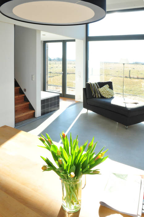 Haus b jebens schoof architekten moderne wohnzimmer | homify