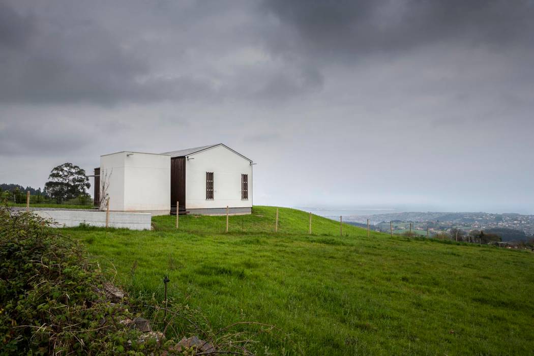 Casa Bioclimática JG, Modulo12 Modulo12 Scandinavian style houses