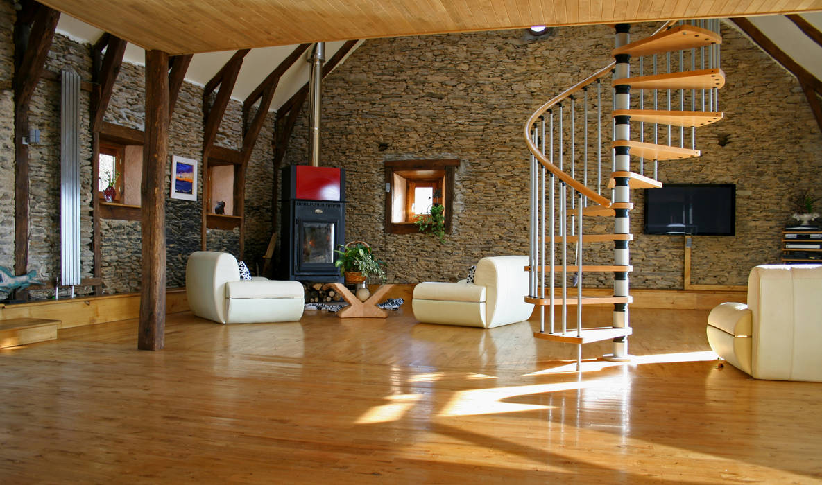 Barn in Chenailler Mascheix, France , Capra Architects Capra Architects Rustic style living room Fireplaces & accessories