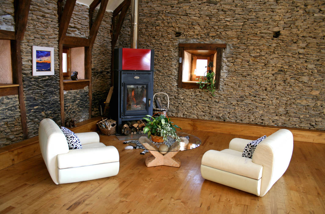 Barn in Chenailler Mascheix, France , Capra Architects Capra Architects Rustic style living room