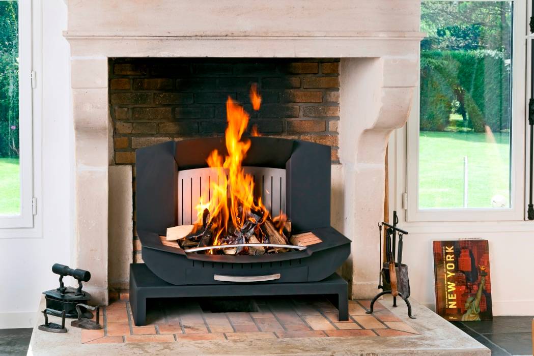 L'insert-ouvert dans une demeure en Ile de France, Finoptim Finoptim Phòng khách phong cách kinh điển Fireplaces & accessories