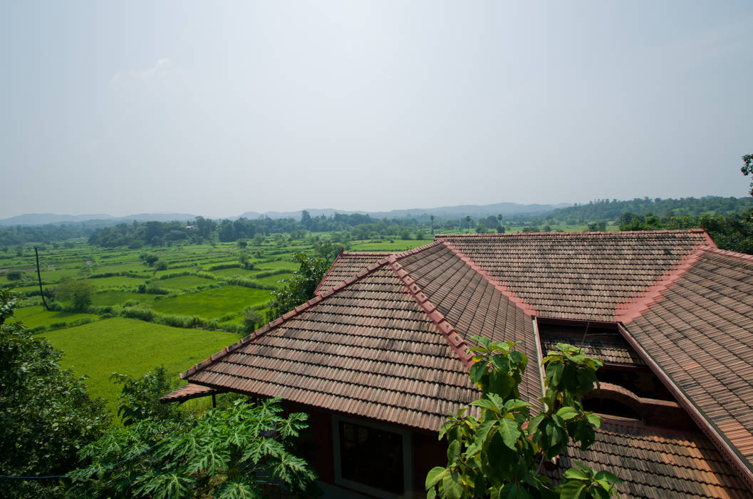 The view of the roof M+P Architects Collaborative Rustic style house