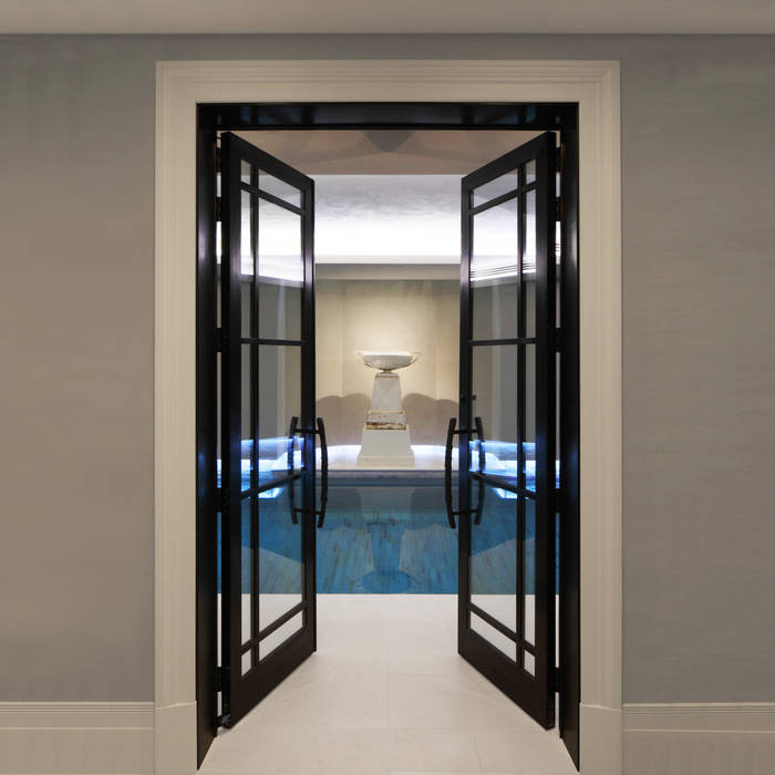 Bronze Doors leading to Swimming Pool homify Дверi Метал Двері