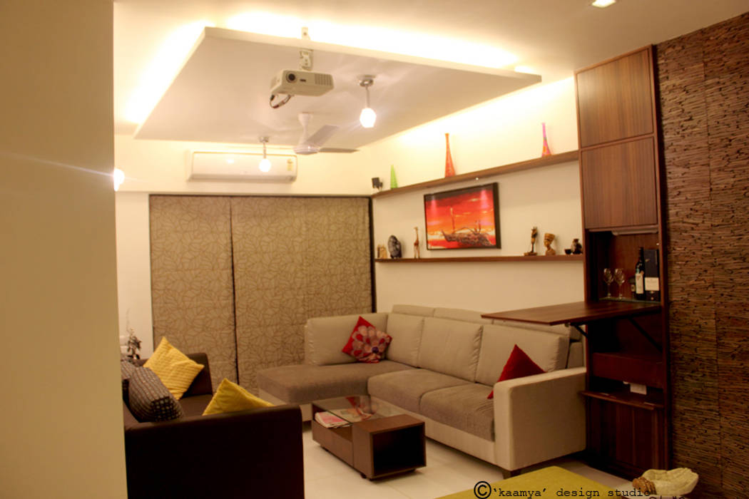 Living Room view: modern by kaamya design studio,Modern